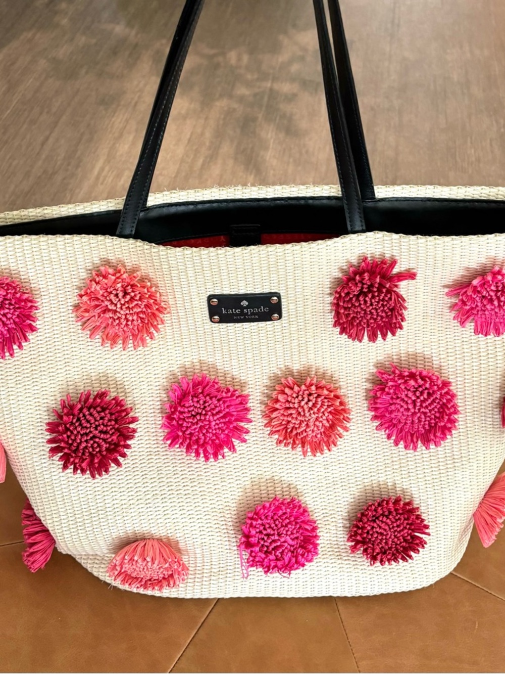 kate spade New York Cream Tote with Pink Pom Pom Accents